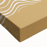 Close-up of a stretched canvas showcasing an abstract minimalist wall art design with soft pastel colors, perfect for modern home decor.