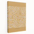 Stretched canvas wall art featuring an abstract minimalist design with soft beige and gray tones, displayed from a side view, perfect for modern home decor.
