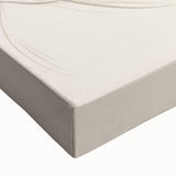 Close-up of a stretched canvas showcasing an abstract minimalist design with soft colors and fluid shapes, perfect for modern wall decor.