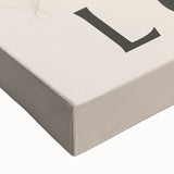 Close-up of a stretched canvas featuring an abstract minimalist design with soft pastel colors, perfect for modern home decor and artistic interiors.