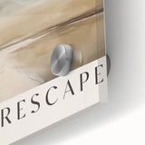 Close-up of an abstract minimalist wall art piece featuring a vibrant design with shades of blue and orange, displayed in a sleek acrylic glass frame, perfect for modern decor.