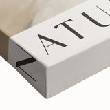 Close-up of a minimalist abstract wall art design on stretched canvas, showcasing soft pastel colors and subtle textures, ideal for modern home decor.