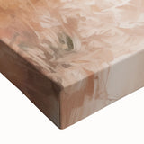 Close-up of a stretched canvas featuring an abstract minimalist design with soft earth tones and geometric shapes, ideal for modern home decor and art enthusiasts.