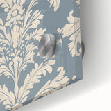 Close-up of an abstract minimalist wall art piece featuring soft pastel colors and geometric shapes, displayed behind acrylic glass for a sleek finish. This artistic design enhances modern interiors, perfect for stylish home decor.