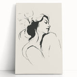 Abstract minimalist wall art collection displayed on a stretched canvas, featuring soft blue and beige tones, leaning against a white wall, perfect for modern decor.