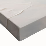 Close-up of a stretched canvas showcasing an abstract minimalist design featuring soft earth tones and geometric shapes, perfect for modern home decor.