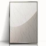 Framed abstract minimalist wall art displaying a silver acrylic design, showcasing a contemporary aesthetic perfect for modern home decor.