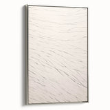 Framed canvas artwork showcasing an abstract minimalist design with silver accents, displayed at a side angle, perfect for modern home decor.