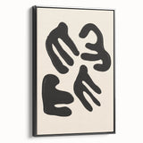 Framed minimalist black wall art canvas showcasing an abstract design, viewed from the side, perfect for modern home decor.