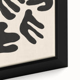 Close-up of an abstract minimalist wall art design featuring soft earth tones and geometric shapes, elegantly framed for modern decor.