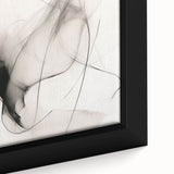 Close-up of a framed canvas print showcasing an abstract minimalist design featuring soft pastel colors and geometric shapes, perfect for modern home decor.