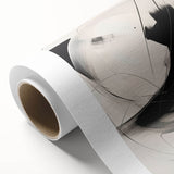 Abstract minimalist wall art featuring soft pastel colors and geometric shapes, elegantly rolled and ready for display, ideal for modern home decor.