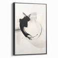 Framed abstract minimalist wall art featuring a sleek black design with a contemporary aesthetic, showcased from a side view, ideal for modern home decor.