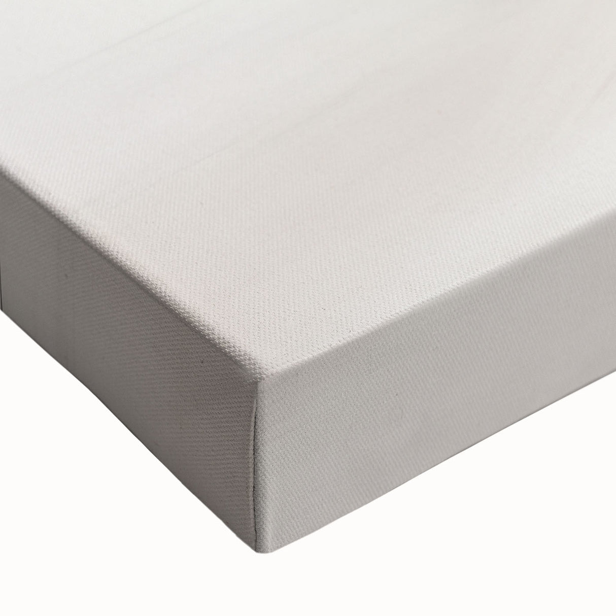 Close-up of a stretched canvas featuring an abstract minimalist wall art design with soft pastel colors and geometric shapes, ideal for modern home decor.