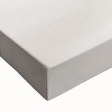 Close-up of a stretched canvas featuring an abstract minimalist wall art design with soft pastel colors and geometric shapes, ideal for modern home decor.