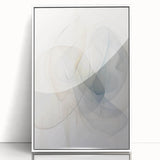 Framed minimalist wall art featuring an abstract design with soft colors, displayed in a sleek white frame, perfect for modern home décor.