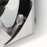 Close-up of an abstract modern wall art design featuring vibrant colors and dynamic shapes, displayed on acrylic glass to enhance visual depth and texture.