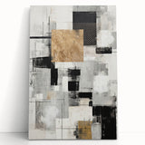 Abstract modern wall art collection featuring vibrant colors and geometric patterns on stretched canvas, elegantly leaning against a neutral wall, perfect for contemporary decor.