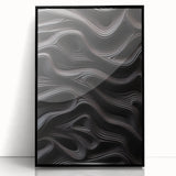 Framed abstract modern wall art showcasing a unique design with vibrant colors and geometric shapes, featuring a sleek black frame for an elegant display.