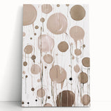 Abstract modern wall art collection featuring vibrant colors and geometric patterns on stretched canvas, leaning against a neutral wall, ideal for contemporary decor.