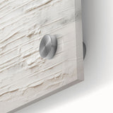 Close-up of an abstract modern wall art collection featuring vibrant acrylic and glass elements, showcasing intricate designs and textures ideal for contemporary decor.