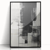 Framed abstract modern wall art collection featuring bold geometric shapes in black and white, designed to enhance contemporary interiors with a sleek aesthetic.