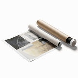 Abstract modern wall art print featuring vibrant geometric shapes in bold colors, rolled and packaged securely in a cardboard tube for easy transport and display.