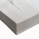 Close-up view of a stretched canvas featuring an abstract modern design with vibrant colors and intricate patterns, perfect for home decor enhancement.