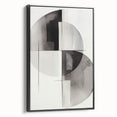 Framed canvas wall art showcasing an abstract modern design with bold black tones and geometric patterns, displayed in a stylish setting to enhance decor.