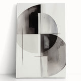 Stretched canvas wall art featuring an abstract modern design in vibrant colors, leaning against a wall, perfect for contemporary home decor.