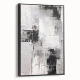 Framed abstract modern wall art featuring a black and white design, displayed from a side view, perfect for contemporary home decor. The canvas adds a stylish touch to any room.