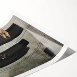 Abstract modern wall art print showcasing vibrant geometric shapes in blue, orange, and yellow tones, elegantly rolled and ready for framing. Perfect for contemporary decor.