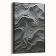 Framed modern abstract wall art featuring bold black and white geometric designs, showcasing a sleek side view against a neutral backdrop, ideal for contemporary decor.