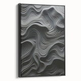 Framed modern abstract wall art featuring bold black and white geometric designs, showcasing a sleek side view against a neutral backdrop, ideal for contemporary decor.