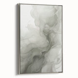 Framed canvas wall art showcasing an abstract modern design with a silver frame, perfect for contemporary decor, displayed from a side view against a neutral background.