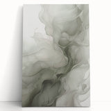 Abstract modern wall art collection featuring vibrant colors and geometric shapes on stretched canvas, elegantly leaning against a white wall for a contemporary decor touch.