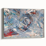 Framed abstract wall art with splattered paint design in vibrant colors, showcasing a modern aesthetic with a sleek silver frame.