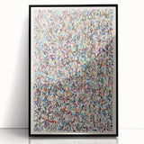 Framed abstract wall art featuring vibrant splatter designs in blue, pink, and yellow, set against a sleek black frame for modern decor.