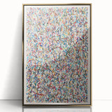 Framed abstract wall art showcasing vibrant gold and blue splatters on an acrylic surface, perfect for modern home decor and artistic expression.