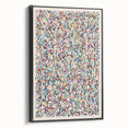 Framed abstract wall art featuring colorful splatter designs on canvas, displayed against a black background to enhance vibrancy and depth.