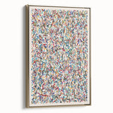 Framed wall art showcasing an abstract splatter design in vibrant gold tones, adding a modern touch to any decor.