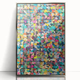 Framed abstract wall art featuring colorful splatter designs in a sleek silver frame, perfect for modern home decor and artistic ambiance.