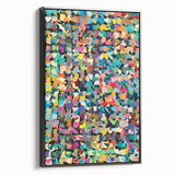 Framed canvas wall art displaying an abstract splatter design in vibrant colors, showcasing a black side view with a sleek finish.