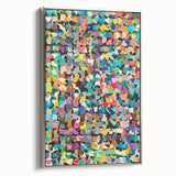 Framed wall art featuring an abstract splatter design in vibrant colors, showcasing a silver frame from a side view, perfect for modern decor.