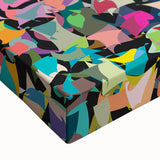 Close-up of abstract splatter design canvas wall art showcasing vibrant colors and dynamic patterns, perfect for modern home decor accents.