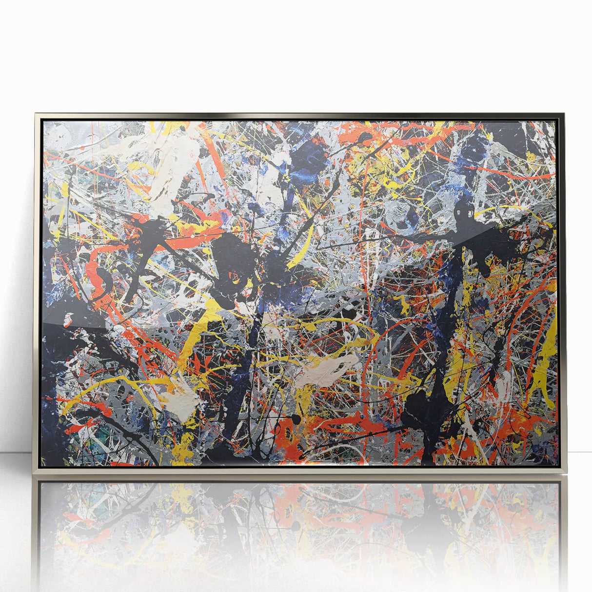 Framed abstract wall art featuring colorful splatter designs in a sleek silver frame, perfect for modern home decor and artistic expression.