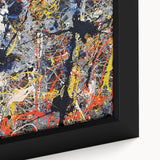Close-up view of a framed abstract wall art piece showcasing vibrant splatter designs in rich colors, ideal for modern home decor.