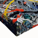 Close-up of an abstract splatter design on stretched canvas, showcasing vibrant colors and dynamic textures, ideal for modern wall art decor.