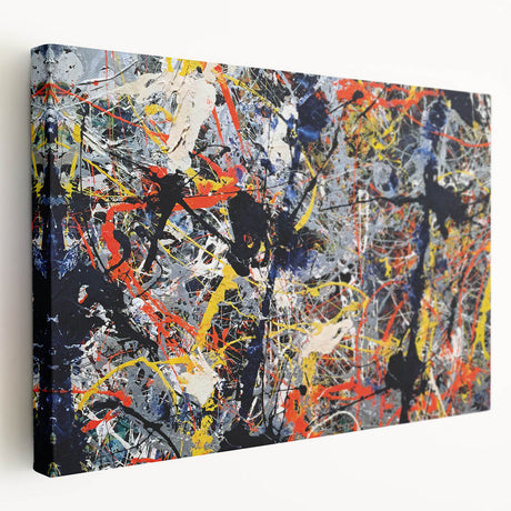 Vibrant abstract splatter design in bold colors on a stretched canvas wall art piece, showcasing dynamic patterns for modern decor.