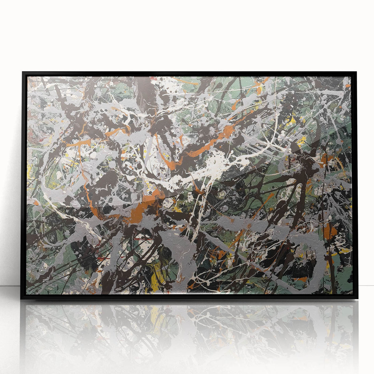 Framed abstract wall art featuring colorful splatter designs on an acrylic surface, showcasing a modern aesthetic with a sleek black frame.